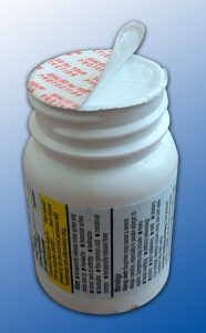 pill bottle lid delamination